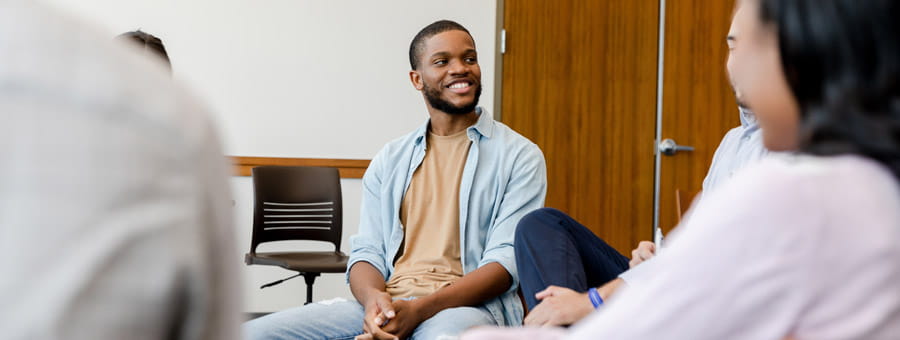 Teens talk in a support group.