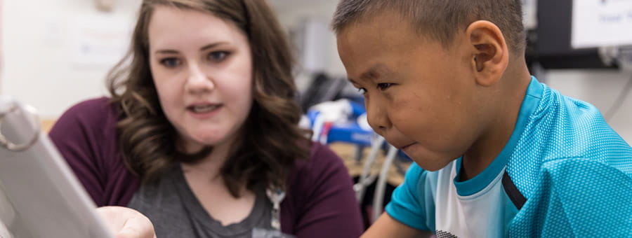 Boy and doctor at clinic.