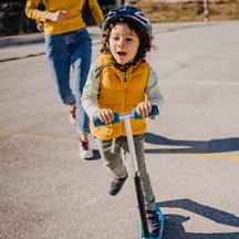 Child on scooter