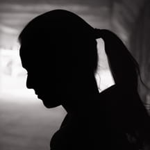 Silhouette of teen girl.